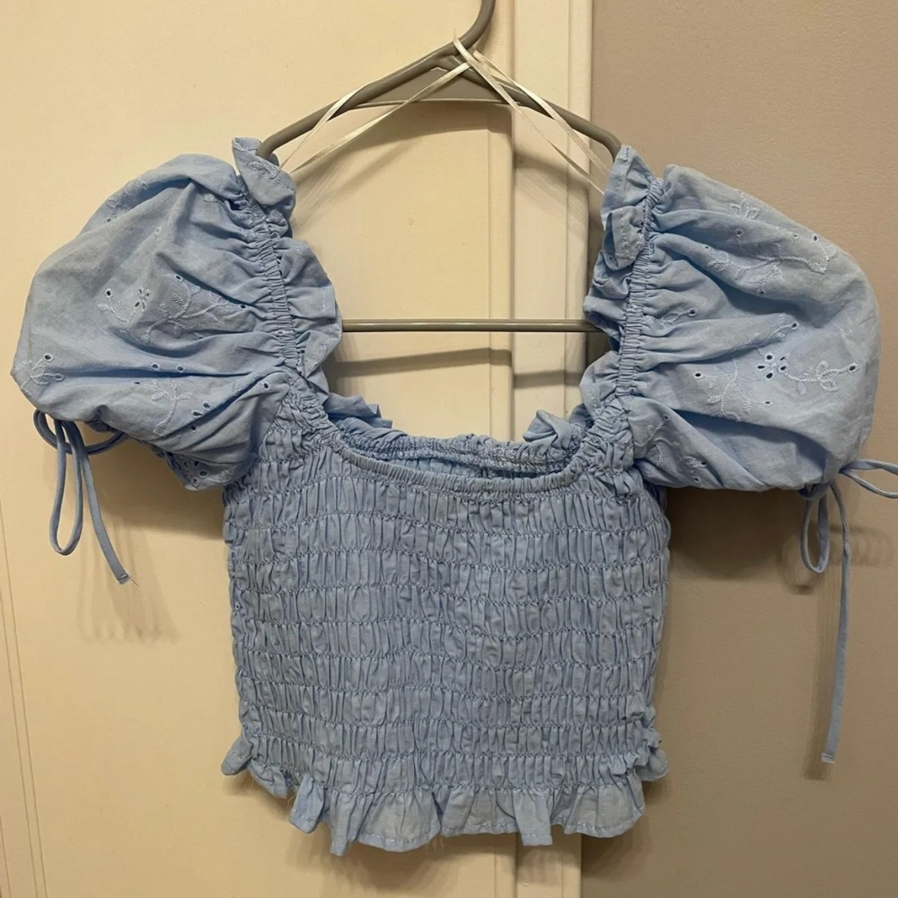Light blue top